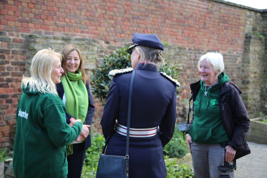 Some of The Green Estate volunteer team meeting Dame Hilary Chapman DBE when she presented The Green Estate with the King’s Award for Enterprise trophy